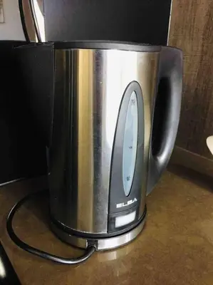 a black and silver appliance sitting on a counter at 5 Stars Seafront Suite By The Sea \u65e5\u843d\u65e0\u654c\u5168\u6d77\u666f 5\u661f \u9152\u5e97\u7b49\u7ea7 in Batu Ferringhi