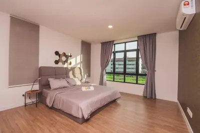 a bedroom with a bed and a large window at Luxury 3-sty semi-D 5BR 5Bath@Batu Ferringhi 15ppl in Batu Ferringhi