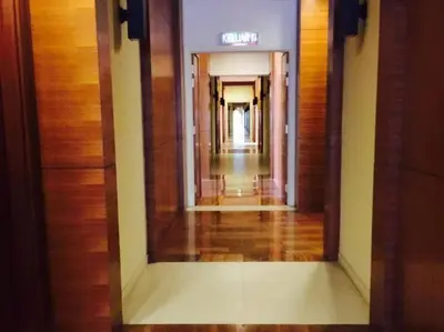 a hallway in a building with a hallway at 2Beds Seaview Straits Quay comes with Carpark and Hothub in Bagan Jermal