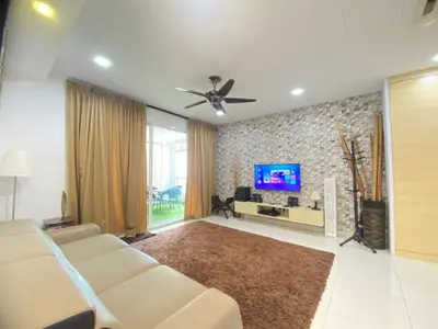 a living room with a couch and a flat screen tv at Lovely Cozy studio 3pax@mansion one Gurney in George Town