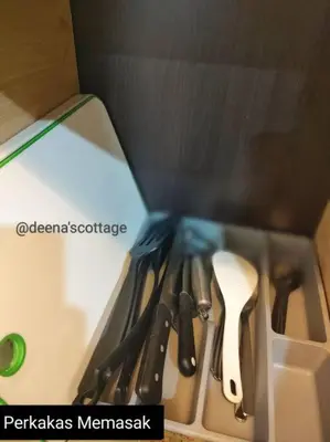 a drawer with utensils in a box at Deena's Cottage Homestay Kulim Hitech Hospital Kulim, Three bedrooms Single Storey Terrace House in Kulim