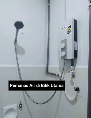 a bathroom stall with a urinal and a toilet at Deena's Cottage Homestay Kulim Hitech Hospital Kulim, Three bedrooms Single Storey Terrace House in Kulim