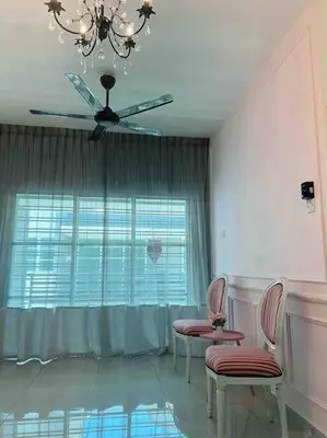 a living room with two chairs and a ceiling fan at Sweet HOME FOR BIG Family\uff5c11pax+FREE WIFI in Sitiawan