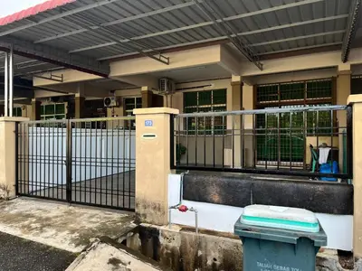 a blue toilet sitting in front of a building at Tapak 173 by Sutera Hōmes in Sungai Petani