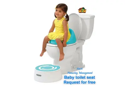 a little girl sitting on a baby toilet seat at H2H - Cherry house Majestic in Ipoh