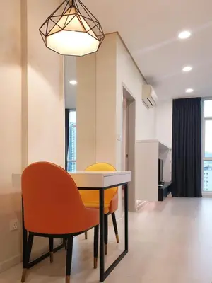 a dining room with a table and two chairs at Charming Studio 1BR 1LR Condo Georgetown \u9b45\u529b\u4e00\u5ba4\u4e00\u5385\u5957\u623f in George Town