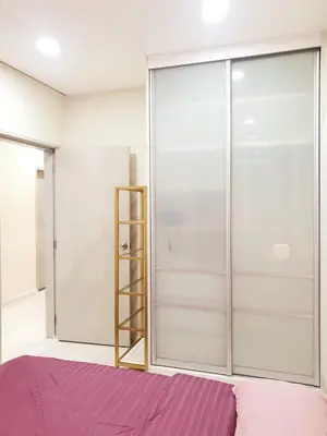 a bedroom with sliding glass doors and a ladder at Charming Studio 1BR 1LR Condo Georgetown \u9b45\u529b\u4e00\u5ba4\u4e00\u5385\u5957\u623f in George Town