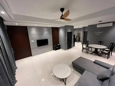 a living room with a couch and a table at Villa 8812 \u6781\u7b80\u98ce\u6c11\u5bbf \u8212\u9002\u73b0\u4ee3\u98ce in Kampong Sungai Udang