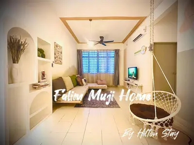 a living room with a swing at Muji Home Falim in Ipoh