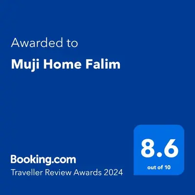 a blue screen with the text upgraded to muff home faith at Muji Home Falim in Ipoh