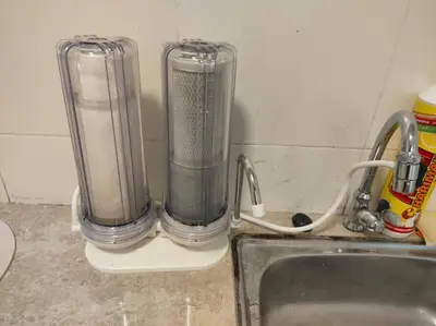 two blenders sitting on a counter next to a sink at Comfy Home Near to SPICE and USM in Bayan Lepas