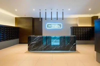 a lobby with a counter with a blue counter top at Paradise Home- 10Pax/4CarPark- Pg Bridge/KPJ Hosp in Bukit Mertajam