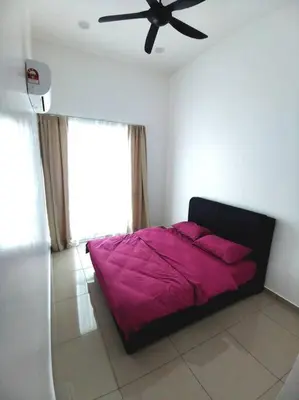 a bedroom with a purple bed with a ceiling fan at Paradise Home- 10Pax/4CarPark- Pg Bridge/KPJ Hosp in Bukit Mertajam