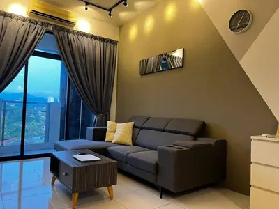 a living room with a couch and a large window at Ipoh Cozy Modern Suite 6-7pax @ Adson's Home in Ipoh
