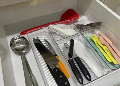 a drawer full of kitchen utensils in a drawer at Sweet Homestay The Venus Sitiawan \u6e29\u99a8\u6c11\u5bbf in Sitiawan