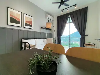 a bedroom with a table and a bed with a window at New The Sun Homestay at Sg Nibong nearby Queensbay or PISA or FTZ Bayan Lepas HENG in Bayan Lepas