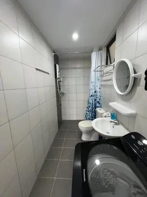 a small bathroom with a sink and a toilet at New The Sun Homestay at Sg Nibong nearby Queensbay or PISA or FTZ Bayan Lepas HENG in Bayan Lepas