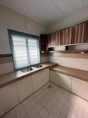 a kitchen with two sinks and a window in it at Ipoh Luxury Spacious Corner Home in Ipoh