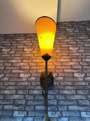 a street light in front of a brick wall at Ipoh Luxury Spacious Corner Home in Ipoh