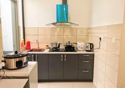 a kitchen with a sink and a stove top oven at FE Cozy Cameron Homestay Family 8 pax 3BR Palas Horizon Brinchang \u91d1\u9a6c\u4f26\u6c11\u5bbf 8\u4eba3\u623f in Brinchang
