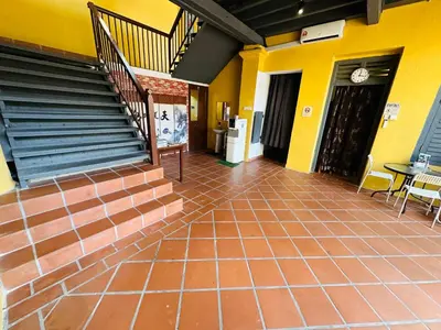 an emptyoyer with a staircase and a tiled floor at The Century Aigoh Hotel in George Town