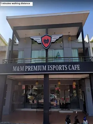 a store with a sign on the front of a building at Galaxy Guest Home by Ipoh Maju Stay in Ipoh