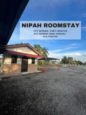a sign that reads nirrh roadeway in a parking lot at NIPAH ROOMSTAY PARIT BUNTAR in Parit Buntar