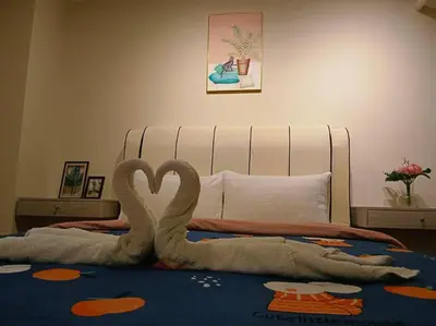 a pair of swans made out of a bed at CEO7 Duplex Business Suite#Disneys HS#USM#Pisa#Pantai Hospital in Bayan Lepas