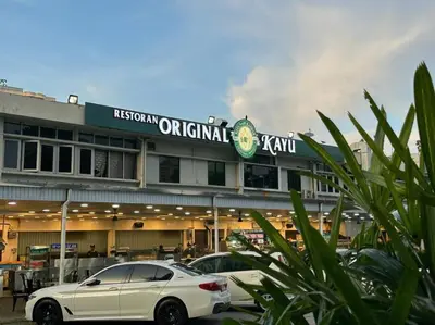 a white car parked in front of a hospital or criminal yard at CEO7 Duplex Business Suite#Disneys HS#USM#Pisa#Pantai Hospital in Bayan Lepas