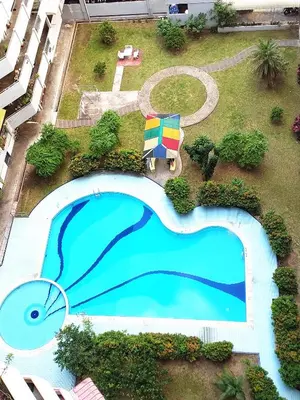 an overhead view of a swimming pool in a resort at EC12-Georgetown-3room-PrivateHouse in Jelutong