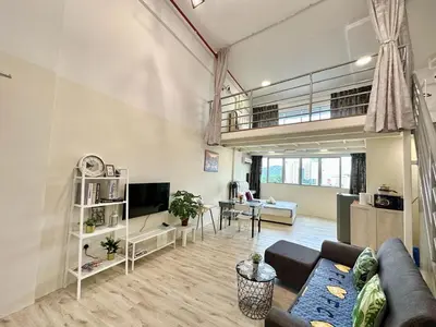 a living room with a couch and a tv at CEO9 Duplex Premier 6 Pax Suite#Disneys HS #PISA #USM #Pantai Hospital in Bayan Lepas