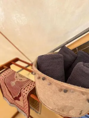 a close up of a basket of towels at The Backyard Glamping Cameron Highlands in Tanah Rata