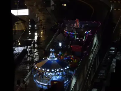 a christmas market on a city street at night at The Gladiator Homstay in Brinchang