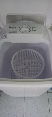 a white washing machine with its door open at 4 Bedrooms Ipoh Landed House, Ipoh Town in Ipoh