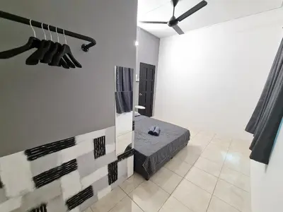 a white room with a bed and a mirror at Air-home M1 Simpang near Aulong Econsave, 4BR, 10pax, Netflix in Simpang