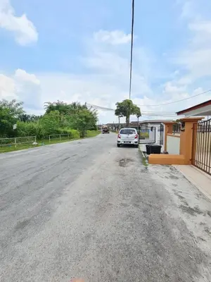 a car parked on the side of a road at Air-home M1 Simpang near Aulong Econsave, 4BR, 10pax, Netflix in Simpang