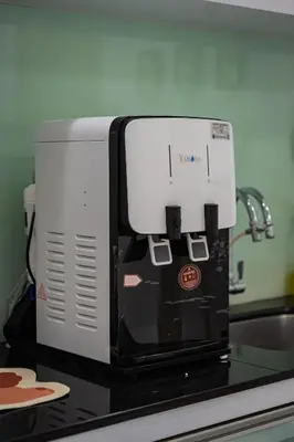 a coffee maker sitting on top of a kitchen counter at GARDEN COZY2STOREY HOME 4ROOM 10PAX@NEAR ALMAJUSCO in Bukit Mertajam