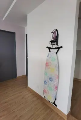 a tie hanging on a wall in a room at Emerald Avenue Cozy 3R3B Apartment 822 in Brinchang