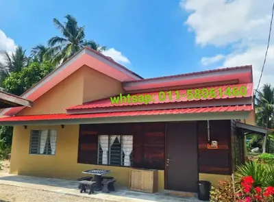 a building with a sign that reads winery grill at Teratak Desa Umaira in Tanjung Karang