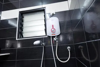 a shower in a bathroom with a mirror at Taiping Aulong [3 rooms] nearby TF Mart/Econsave in Taiping