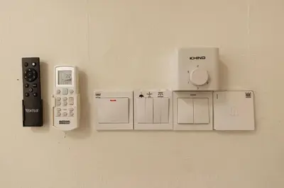 a group of electronic devices on a wall at Taiping Aulong [3 rooms] nearby TF Mart/Econsave in Taiping