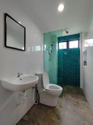 a bathroom with a sink and a toilet and a shower at Sunya Home G02 Raub Pahang in Raub