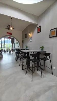 a row of tables in a room with chairs at Sunya Home G02 Raub Pahang in Raub