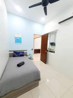a bedroom with a bed and a ceiling fan at MODERN STYLISH 2STOREY HOUSE 8PAX@ALMA NEAR JUSCO in Bukit Mertajam