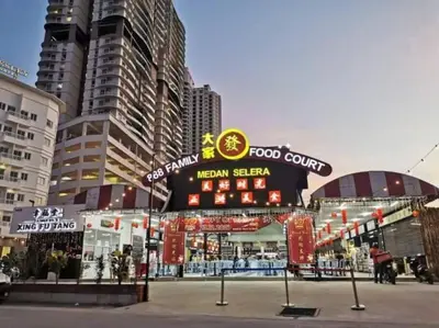 a food court in a city with tall buildings at \u3010NEW\u3011Modern Comfort Studio@Juru Sentral Icon City in Bukit Mertajam