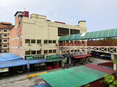 an overhead view of a building with a street at Affordable Cozy Apartment @ Coral Bay Resort in Pasir Bogak