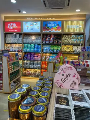 a store filled with lots of different types of food at Affordable Cozy Apartment @ Coral Bay Resort in Pasir Bogak