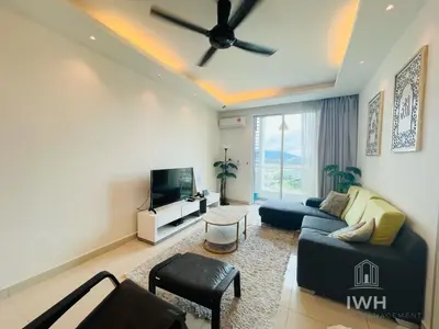 a living room with a blue couch and a tv at Ipoh D Festivo Suites 6-10pax 10mins to Sunway Tambun by IWH in Ipoh