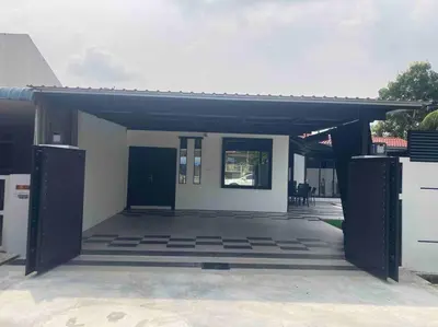 a building with a garage with a door at Abbie's Private Pool Villa Bukit Mertajam Penang in Bukit Mertajam