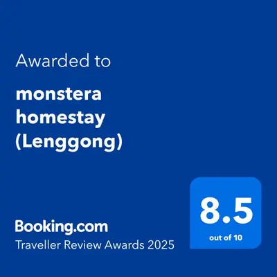 a screenshot of a phone with the text awarded to monstertera homozygosity at monstera homestay (Lenggong) in Kampong Ulu Jepai